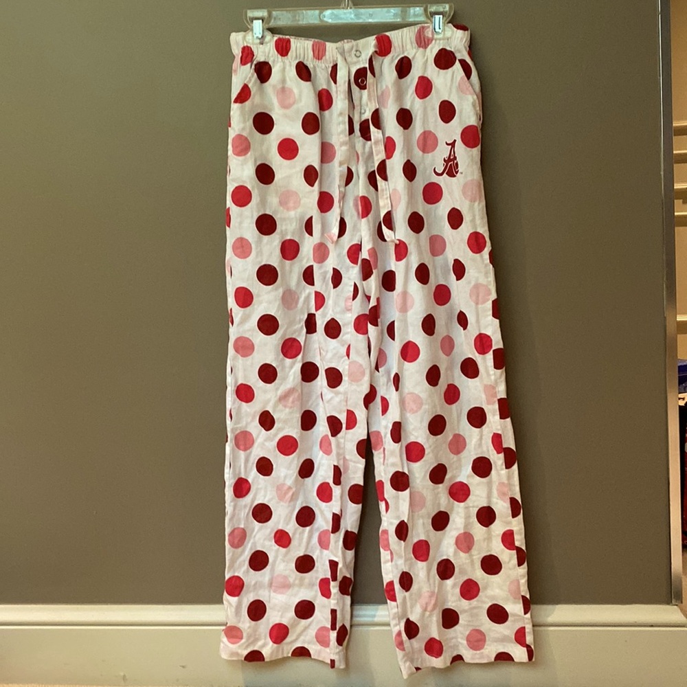 Red, pink polka dot pajama pants. Drawstring waist. Super cute and comfortable.
